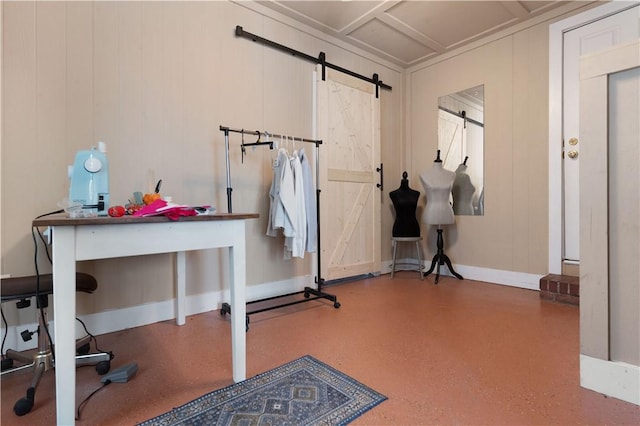 exercise room featuring a barn door