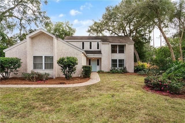 view of property with a front lawn