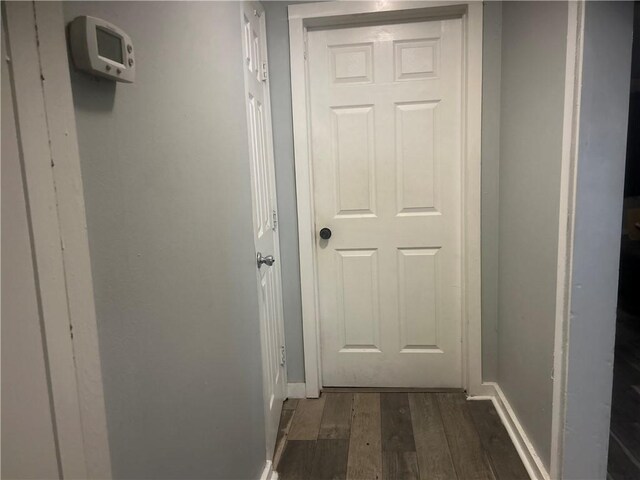 2627 Cleburne St, Brunswick, GA 31520 - hallway with wood finished floors and baseboards