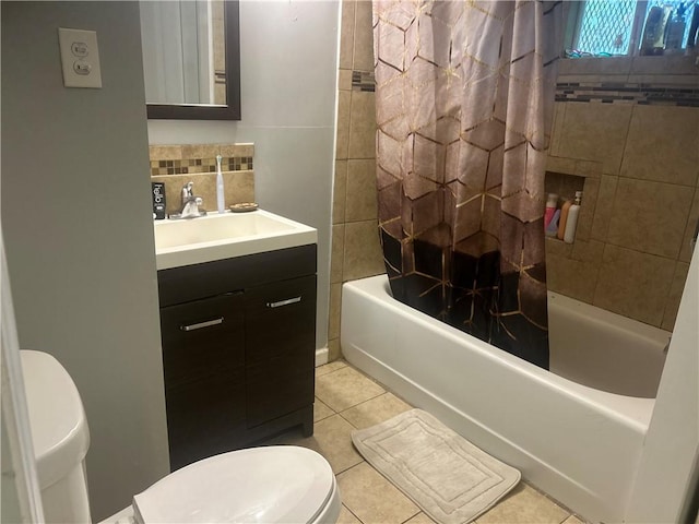 2627 Cleburne St, Brunswick, GA 31520 - bathroom with toilet, shower / bath combo, vanity, tile patterned flooring, and decorative backsplash
