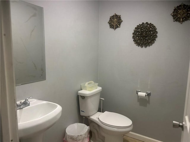 2627 Cleburne St, Brunswick, GA 31520 - bathroom featuring a sink and toilet
