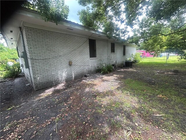 2627 Cleburne St, Brunswick, GA 31520 - back of property with brick siding and central AC unit