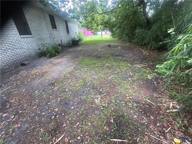 2627 Cleburne St, Brunswick, GA 31520 - view of yard featuring cooling unit