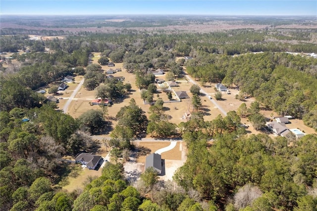 aerial view featuring a forest view