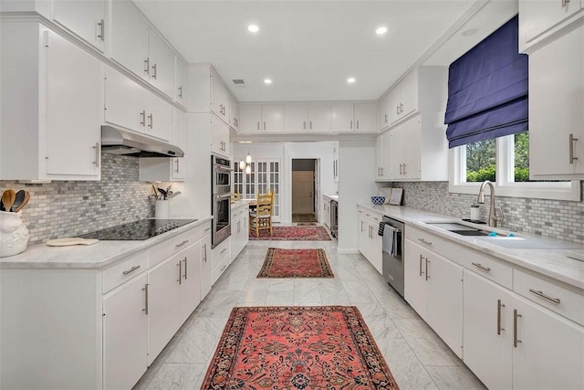 kitchen featuring white cabinetry and appliances with stainless steel finishes