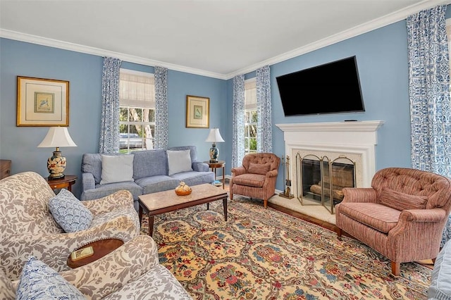 living room with a premium fireplace, carpet floors, and ornamental molding