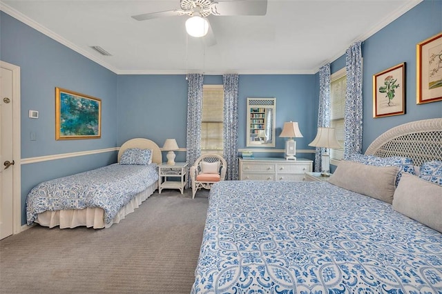 bedroom featuring carpet flooring, ceiling fan, and crown molding