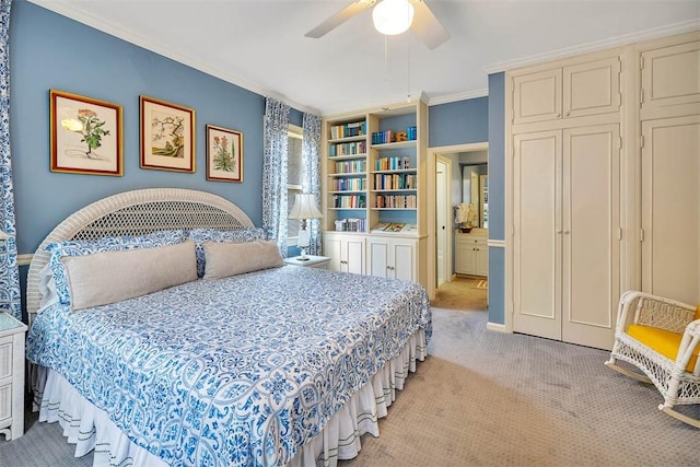 bedroom with ceiling fan, light carpet, and ornamental molding