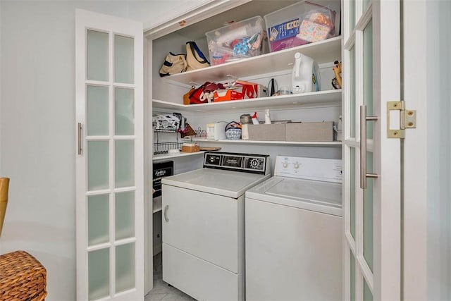 washroom featuring independent washer and dryer