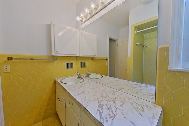 6116 E Main St, Patterson, GA 31557 - full bathroom featuring a wainscoted wall, vanity, a shower, and tile walls