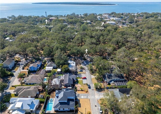 bird's eye view featuring a water view and a residential view