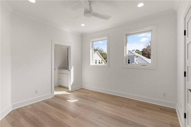 unfurnished bedroom featuring recessed lighting, ornamental molding, light wood finished floors, and baseboards