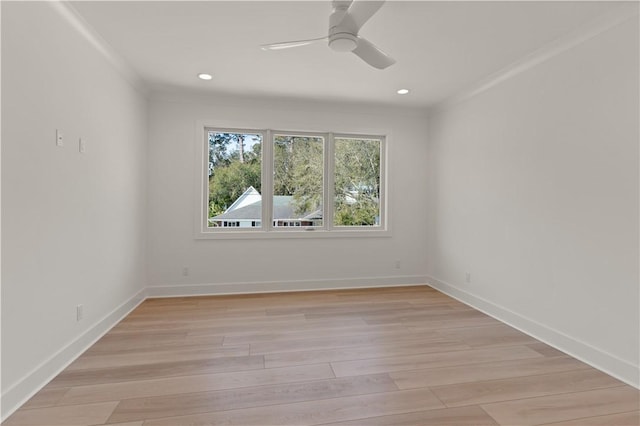 empty room featuring crown molding, recessed lighting, ceiling fan, and light wood-type flooring