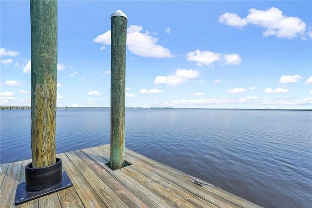 view of dock with a water view