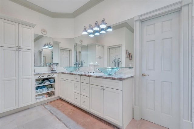 bathroom with vanity and crown molding