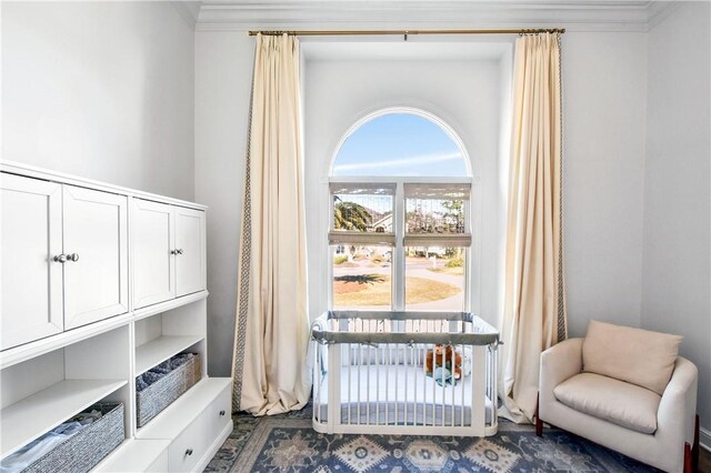 carpeted bedroom featuring high vaulted ceiling and ceiling fan