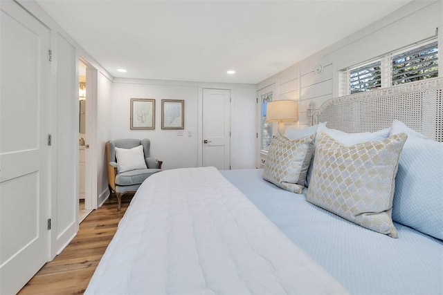 bedroom featuring wood-type flooring