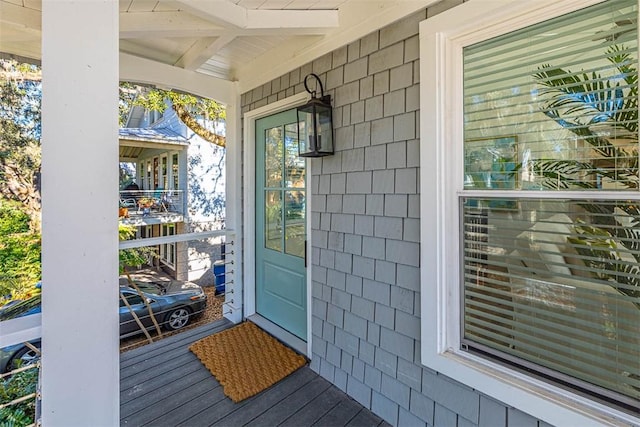 doorway to property featuring a porch