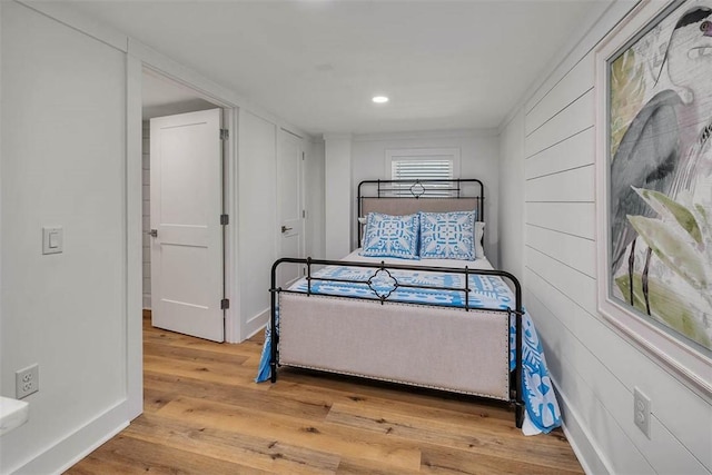 bedroom featuring wood-type flooring