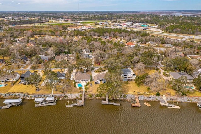 drone / aerial view with a water view