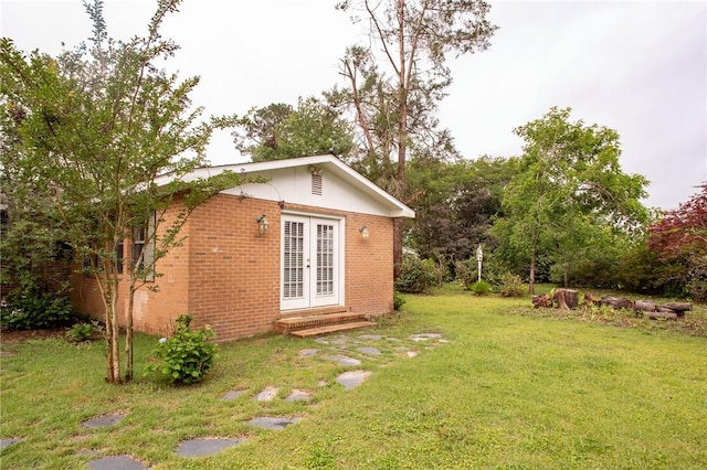 1878 Blalock Ave, Waycross, GA 31503 - view of outdoor structure featuring french doors and entry steps