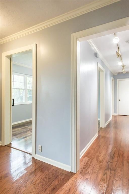 1878 Blalock Ave, Waycross, GA 31503 - corridor with ornamental molding, wood finished floors, and baseboards