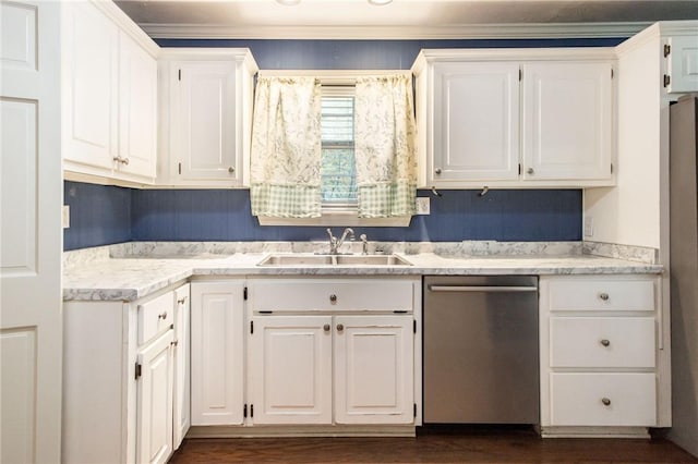 1878 Blalock Ave, Waycross, GA 31503 - kitchen featuring dishwasher, a sink, white cabinetry, light countertops, and dark wood-type flooring