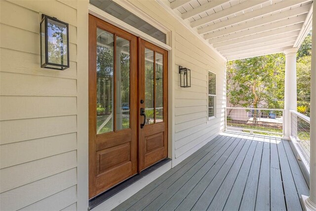 134 Newfield St, Saint Simons Island, GA 31522 - property entrance featuring french doors and covered porch