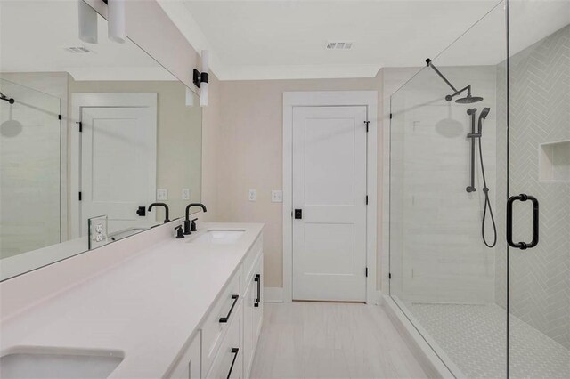 134 Newfield St, Saint Simons Island, GA 31522 - bathroom featuring a stall shower and double vanity