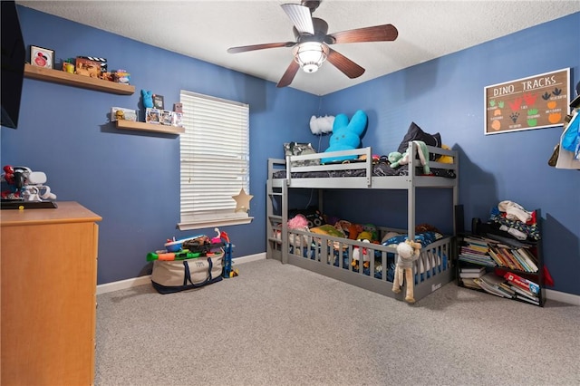 bedroom with carpet flooring and baseboards