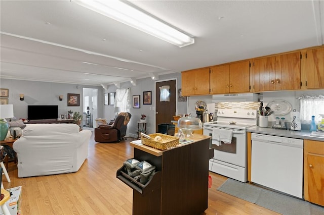 2388 Waycross Hwy, Jesup, GA 31545 - kitchen with white appliances, under cabinet range hood, plenty of natural light, light wood-type flooring, and beamed ceiling