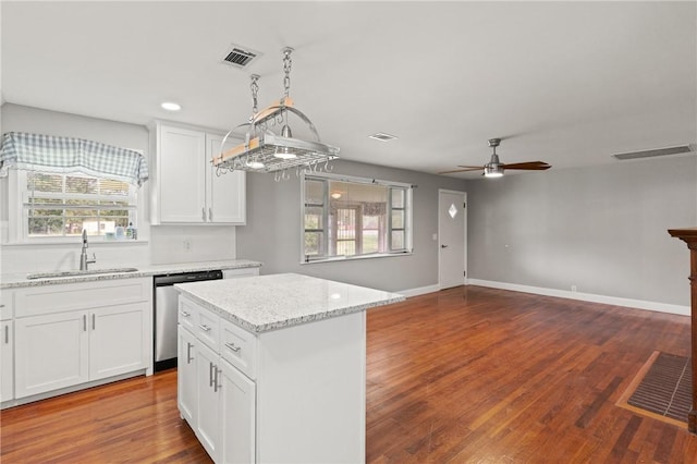 2388 Waycross Hwy, Jesup, GA 31545 - kitchen featuring stainless steel dishwasher, plenty of natural light, ceiling fan, white cabinets, and recessed lighting