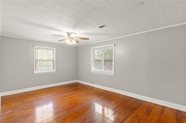 2388 Waycross Hwy, Jesup, GA 31545 - empty room featuring crown molding, a ceiling fan, and wood finished floors