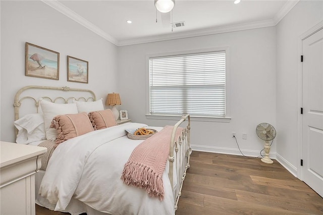 506 Conservation Dr, Saint Simons Island, GA 31522 - bedroom featuring ornamental molding, wood finished floors, recessed lighting, and baseboards