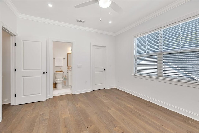 506 Conservation Dr, Saint Simons Island, GA 31522 - unfurnished bedroom featuring crown molding, wood finished floors, baseboards, connected bathroom, and recessed lighting