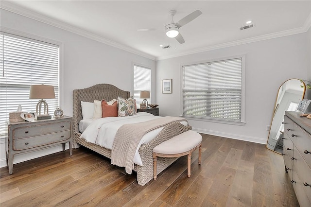 506 Conservation Dr, Saint Simons Island, GA 31522 - bedroom featuring wood finished floors, ornamental molding, baseboards, and a ceiling fan