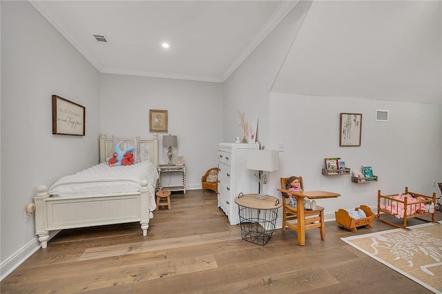 506 Conservation Dr, Saint Simons Island, GA 31522 - bedroom with crown molding, wood finished floors, baseboards, and recessed lighting