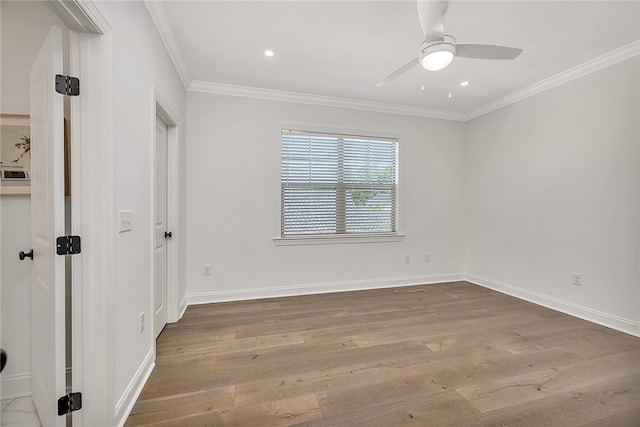 506 Conservation Dr, Saint Simons Island, GA 31522 - unfurnished bedroom with crown molding, wood finished floors, baseboards, recessed lighting, and ceiling fan