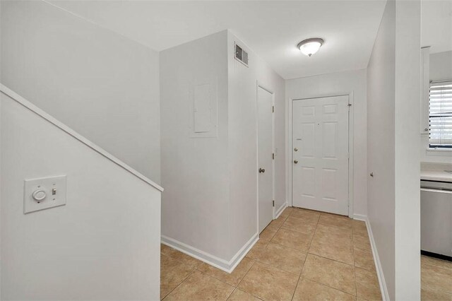 interior space with light tile patterned floors