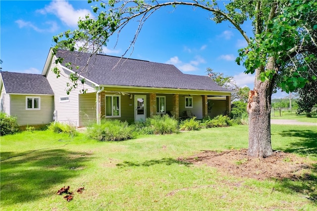 2204 Gibbs St, Waycross, GA 31503 - view of front of house featuring a front lawn and a shingled roof