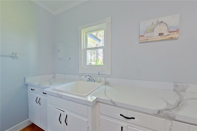 2204 Gibbs St, Waycross, GA 31503 - bathroom with ornamental molding and vanity