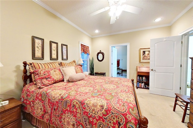 bedroom with a textured ceiling, light colored carpet, ceiling fan, and ornamental molding