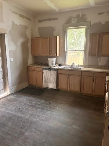 505 N Nicholls St, Waycross, GA 31501 - kitchen featuring dark wood-style flooring, light countertops, and stainless steel dishwasher