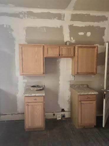 505 N Nicholls St, Waycross, GA 31501 - kitchen with dark wood-type flooring