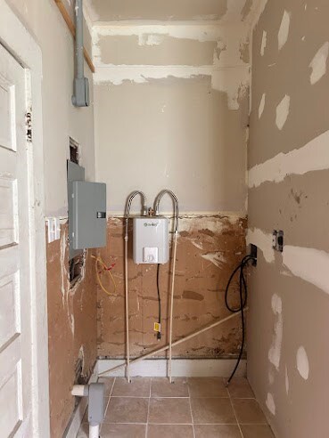 utility room with electric panel