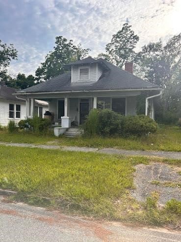 bungalow-style home with covered porch