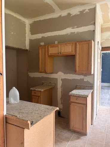 505 N Nicholls St, Waycross, GA 31501 - kitchen with light tile patterned floors