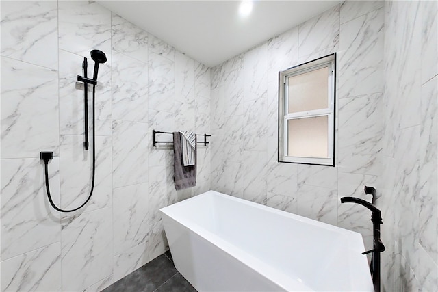 full bath featuring tile walls, a tile shower, and a soaking tub