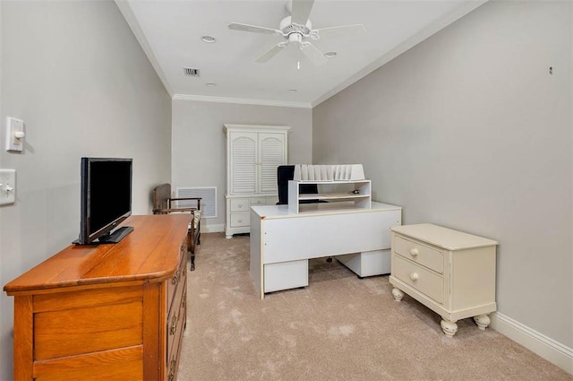 office space featuring light colored carpet, ceiling fan, and crown molding