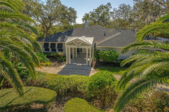 view of front of house featuring a carport